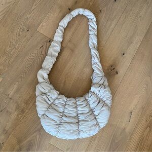 New COS Ripple puffy sling crossbody bag in off white